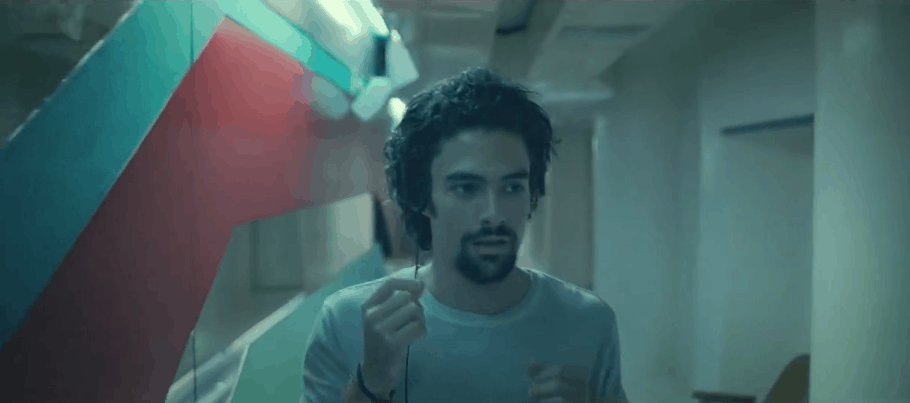 man picking up sounds in a tunnel
