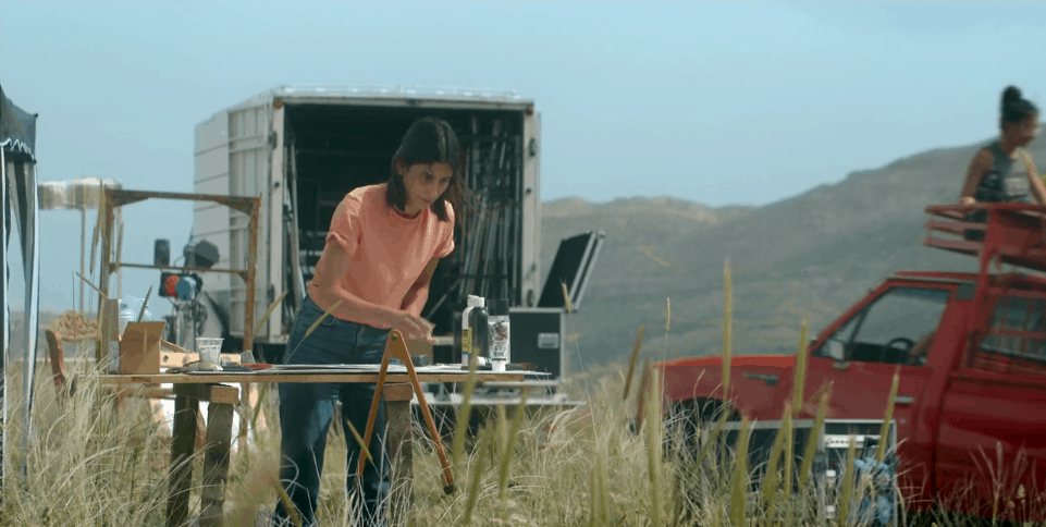 woman with equipment in country side