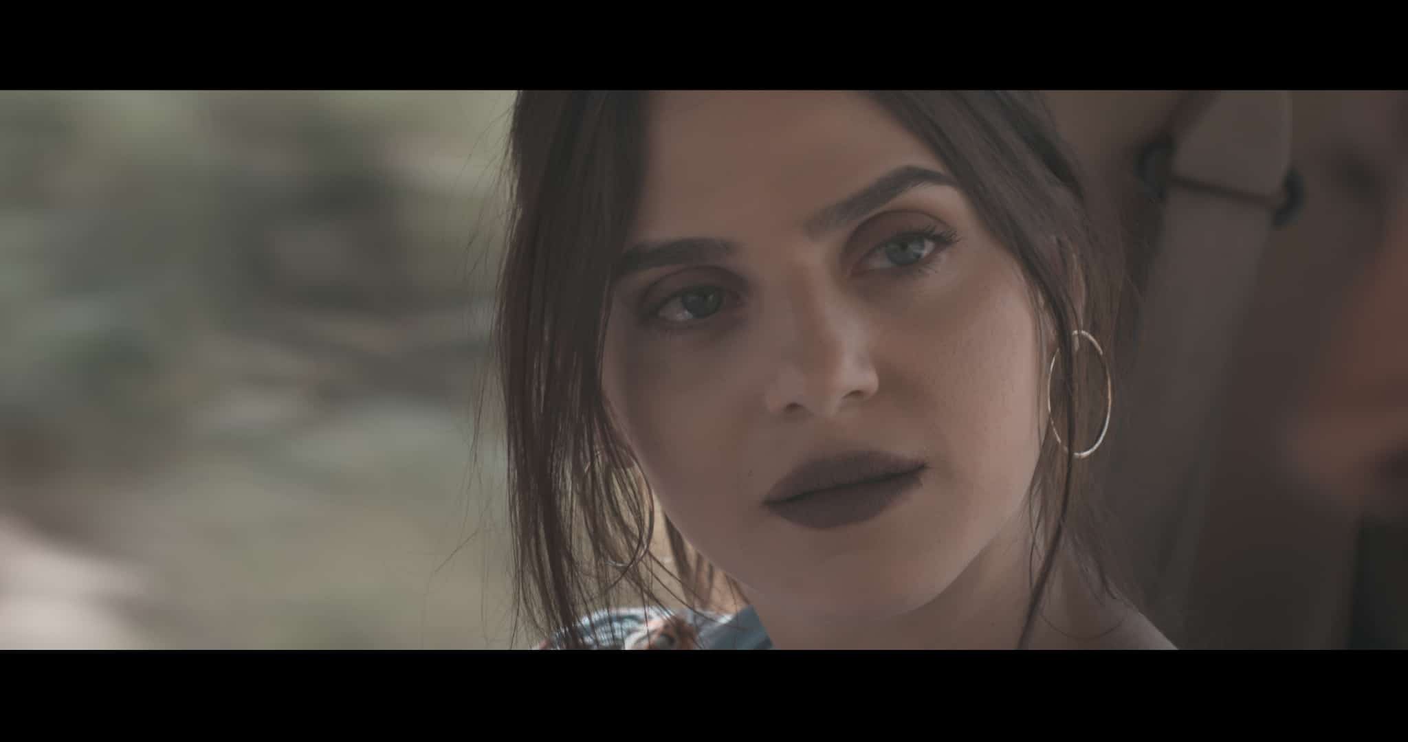 woman with inquisitive stare