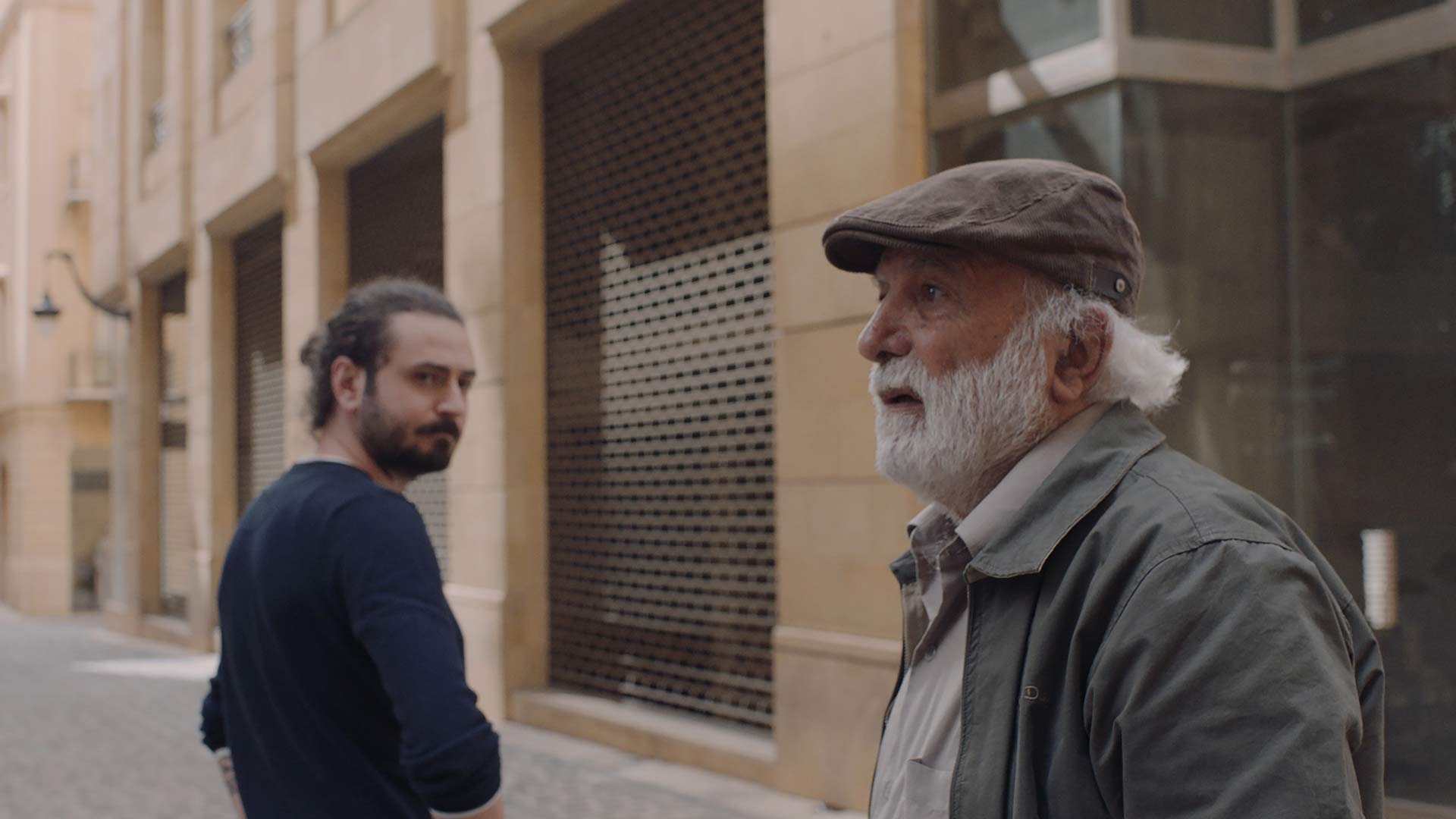 man staring back at protagonist