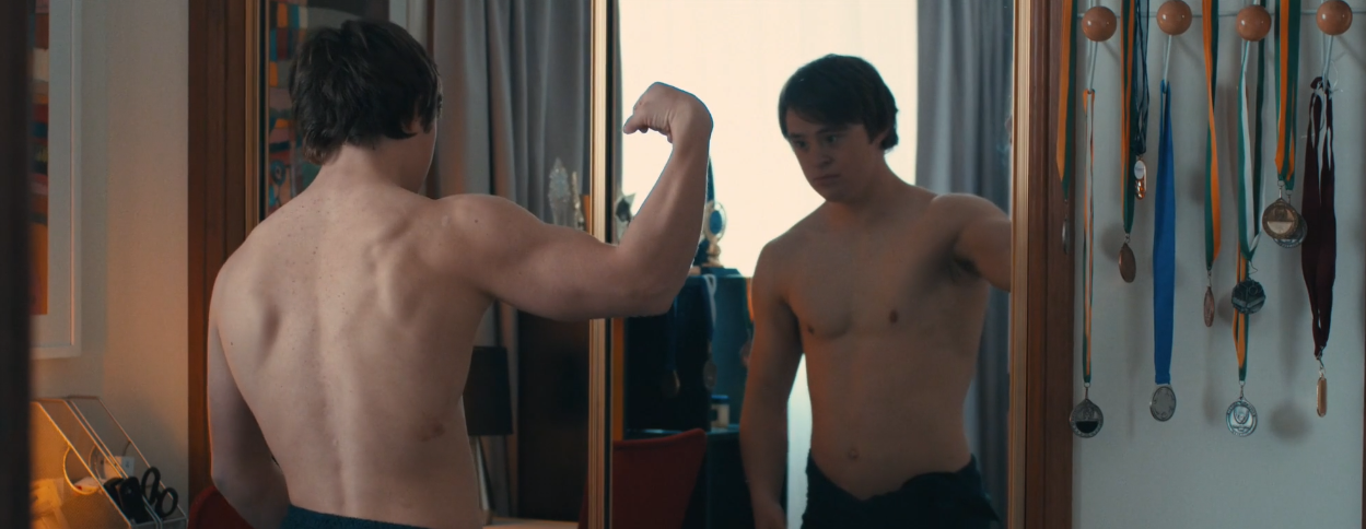 dude checking himself out in mirror
