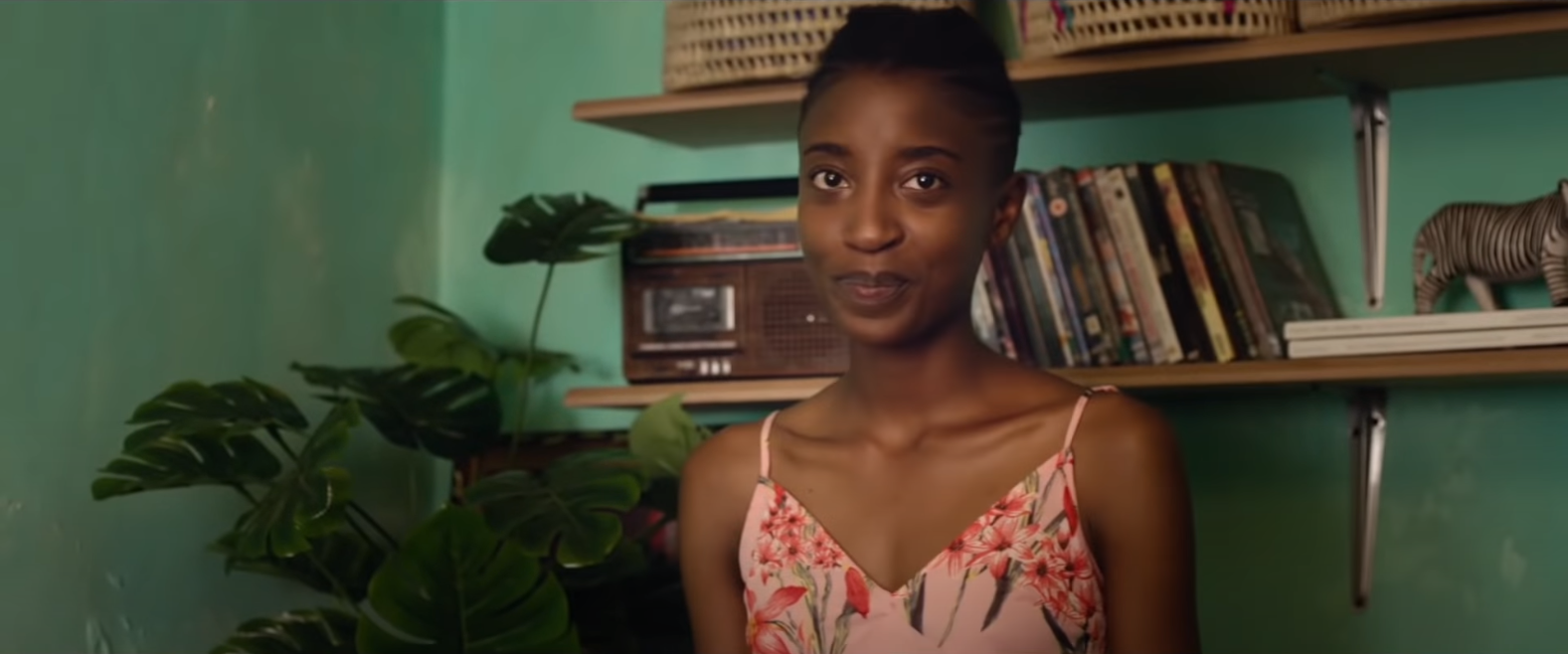 girl in her home - very green walls