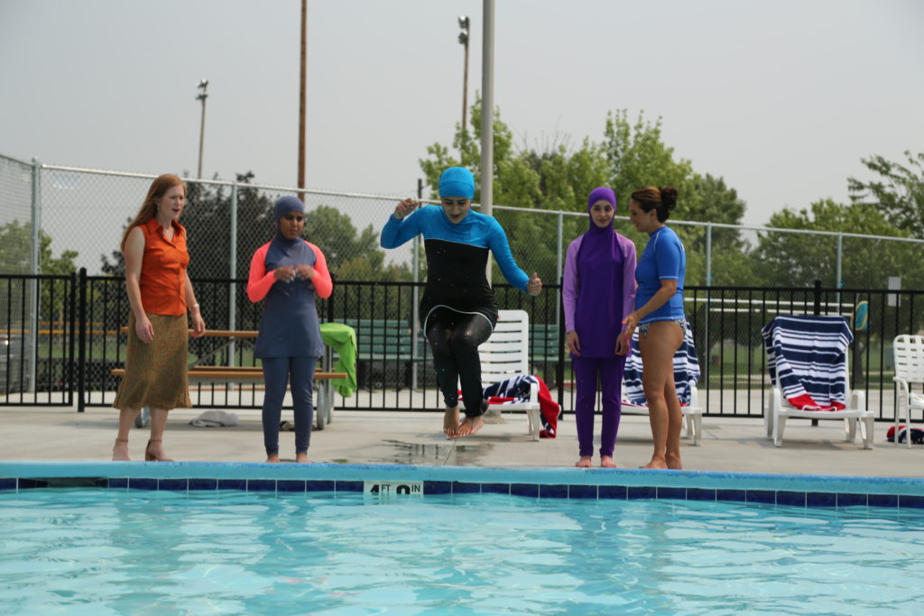 Girl Jumping into pool